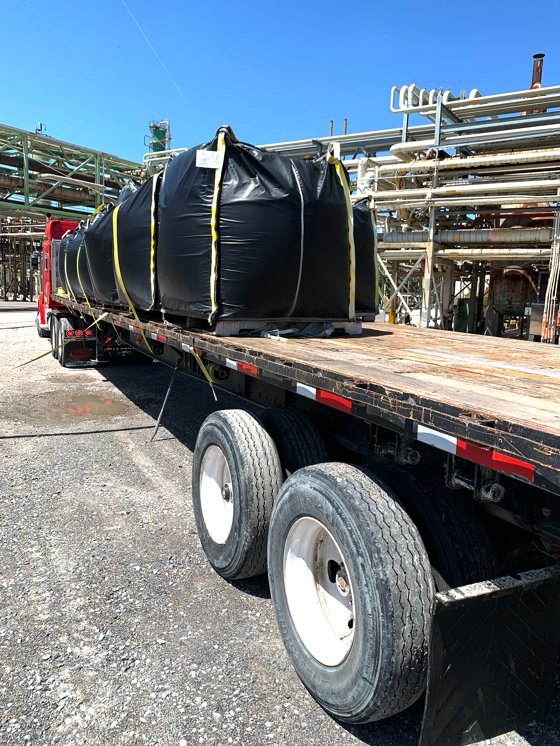 [E] Catalyst Bag- Bags on Flatbed at Industrial Site