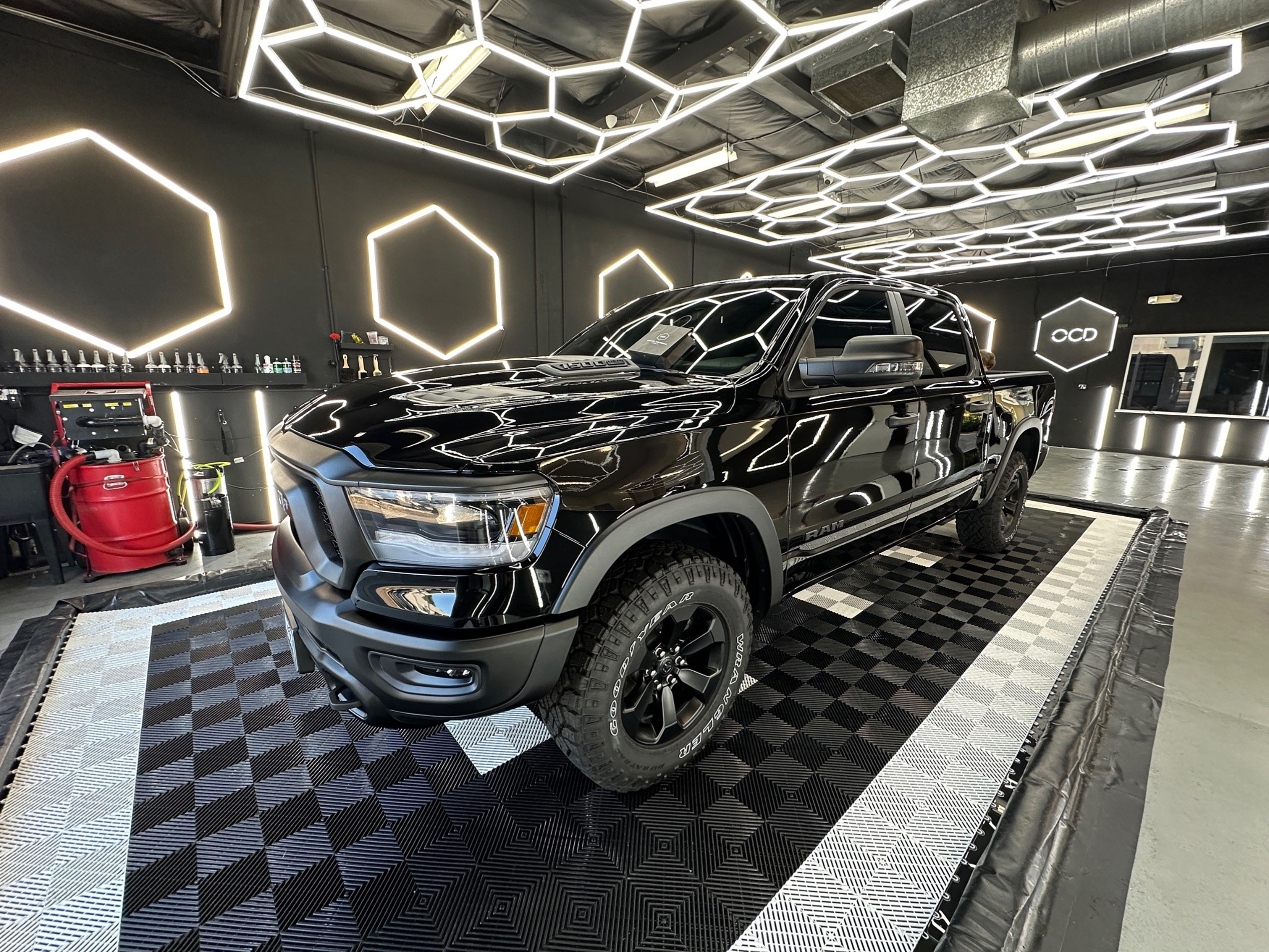 [I] BermPac- Foam Berm in Detailing Shop Under Truck