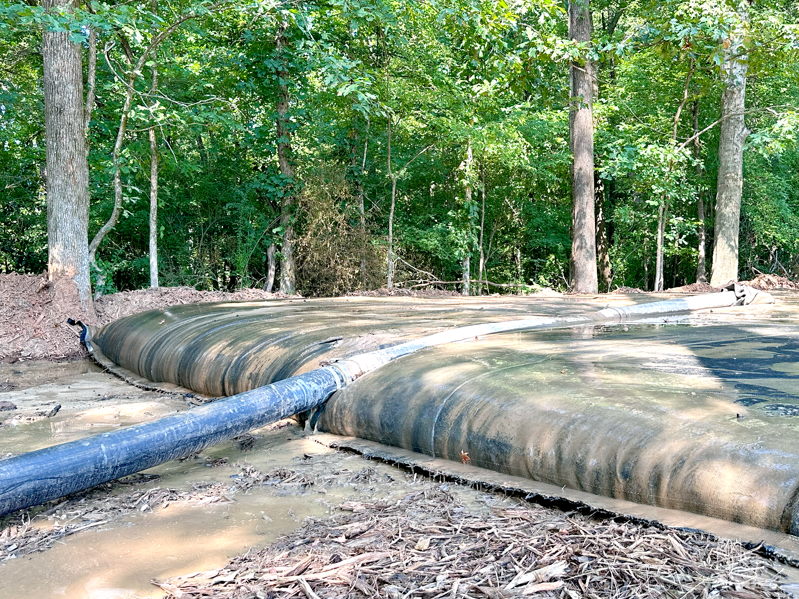 [I] GeoPac- GeoPac Dredging Pond Sludge