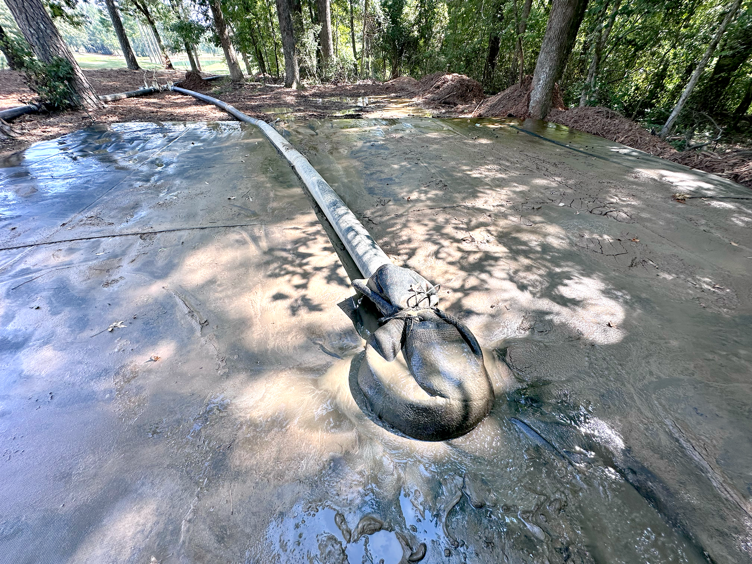 [I] GeoPac- GeoPac Spout Pumping Mud at Golf Course