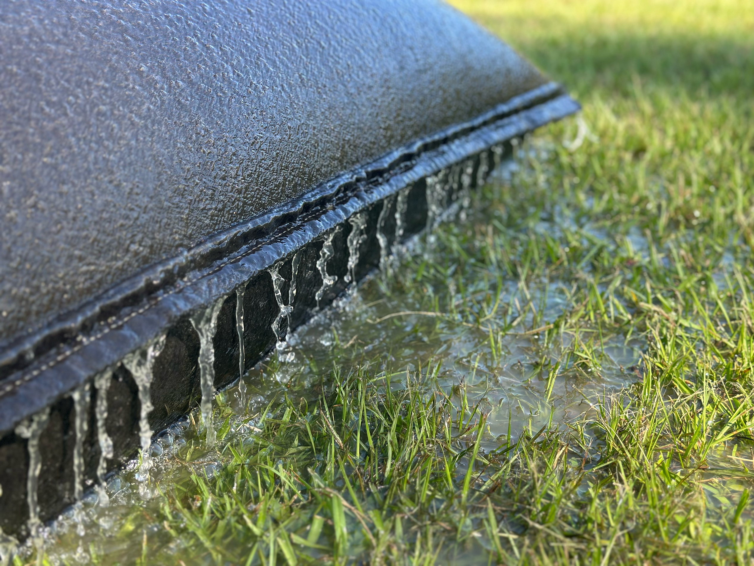 [I] SludgePac- Water Filtering Through CloseUp